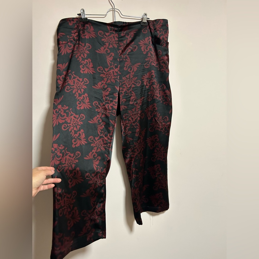 Elegant Black and Red Dress Pants with Ornate Pattern